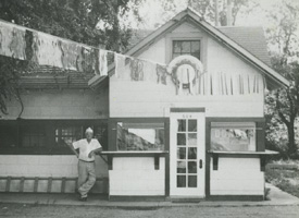 Man and historic Paradise Donut shop